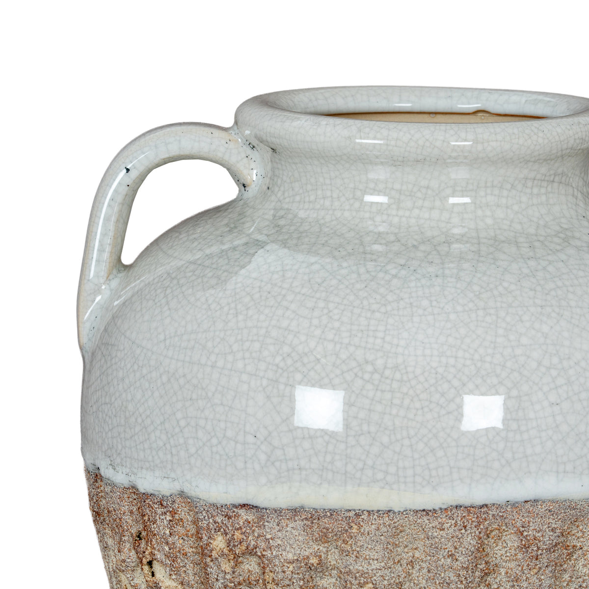 White ceramic jar with textured surface and brown base on a white background