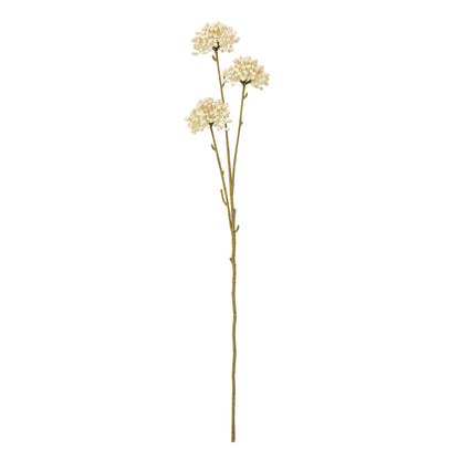 Artificial flower stem with white flowers on a white background