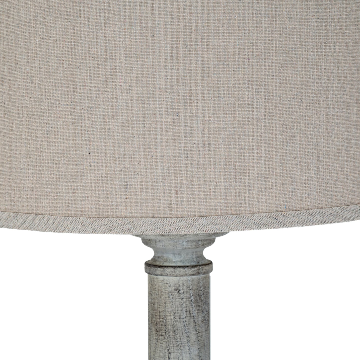 Close-up of a textured lampshade on a white background