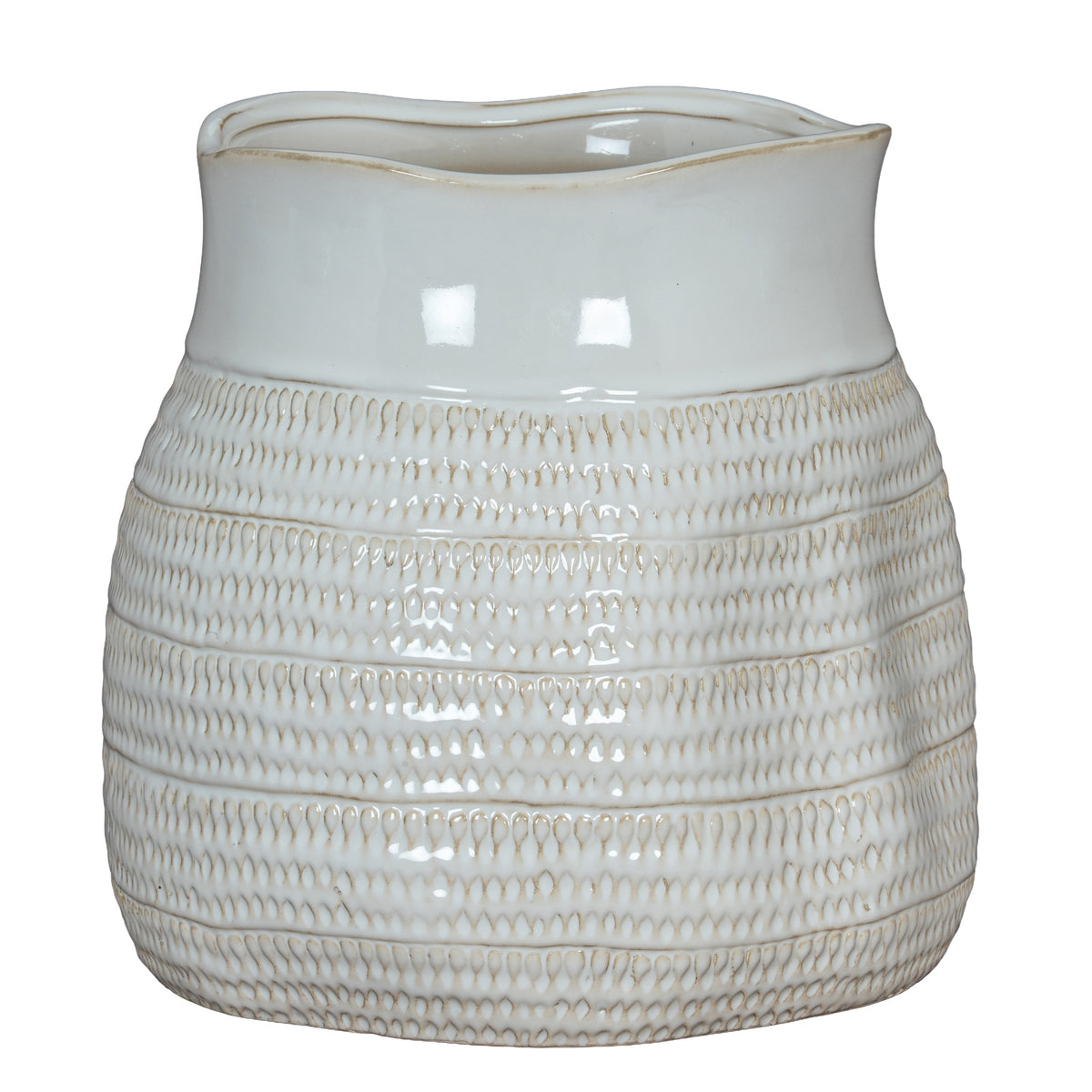 White ceramic pitcher with textured design on a white background