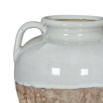White ceramic jar with textured surface and brown base on a white background