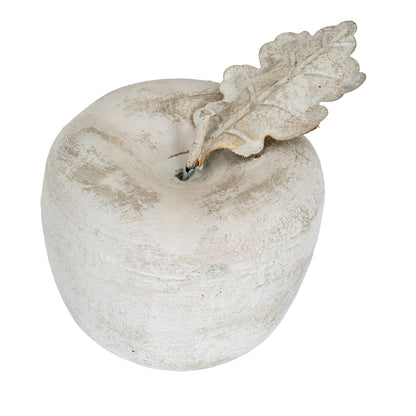 Decorative stone apple with a leaf on a white background
