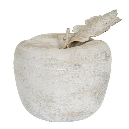 Decorative stone apple with a leaf on a white background